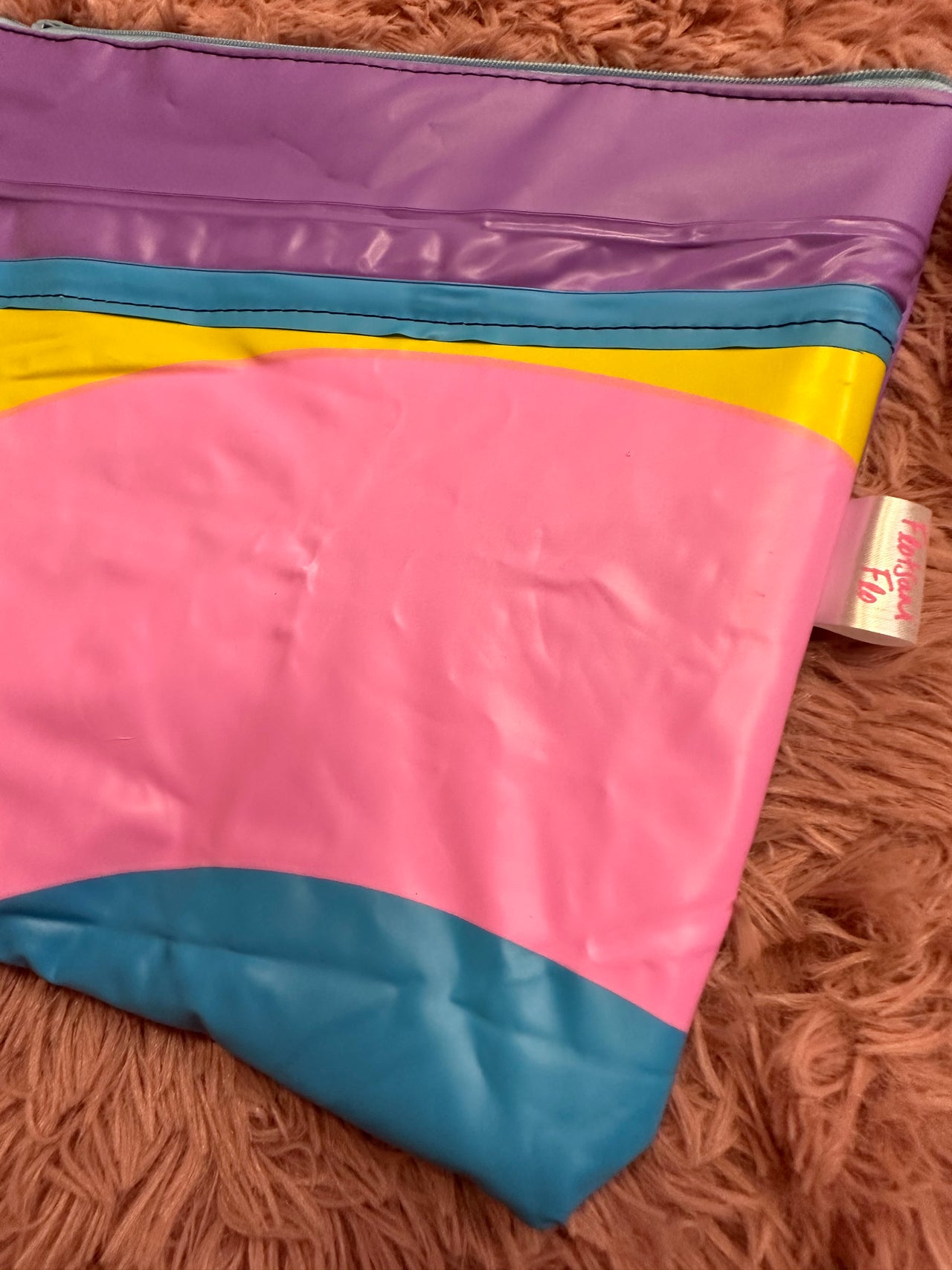 I used to be a broken inflatable and a Banner - Larger Rainbow pouch