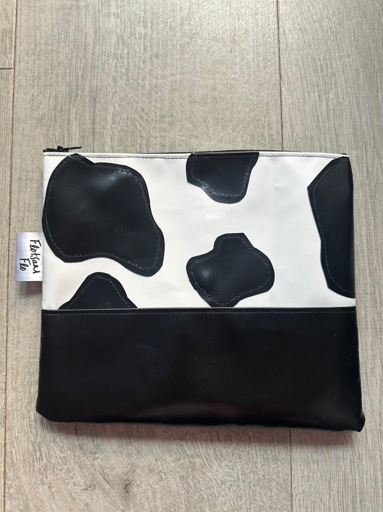 I used to be Offcuts of Plastic Canopy Cow Print - Large Pouch - Black Zip