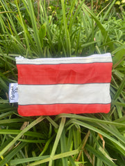 A broken Deck chair saved from landfill and now a handmade small pouch.